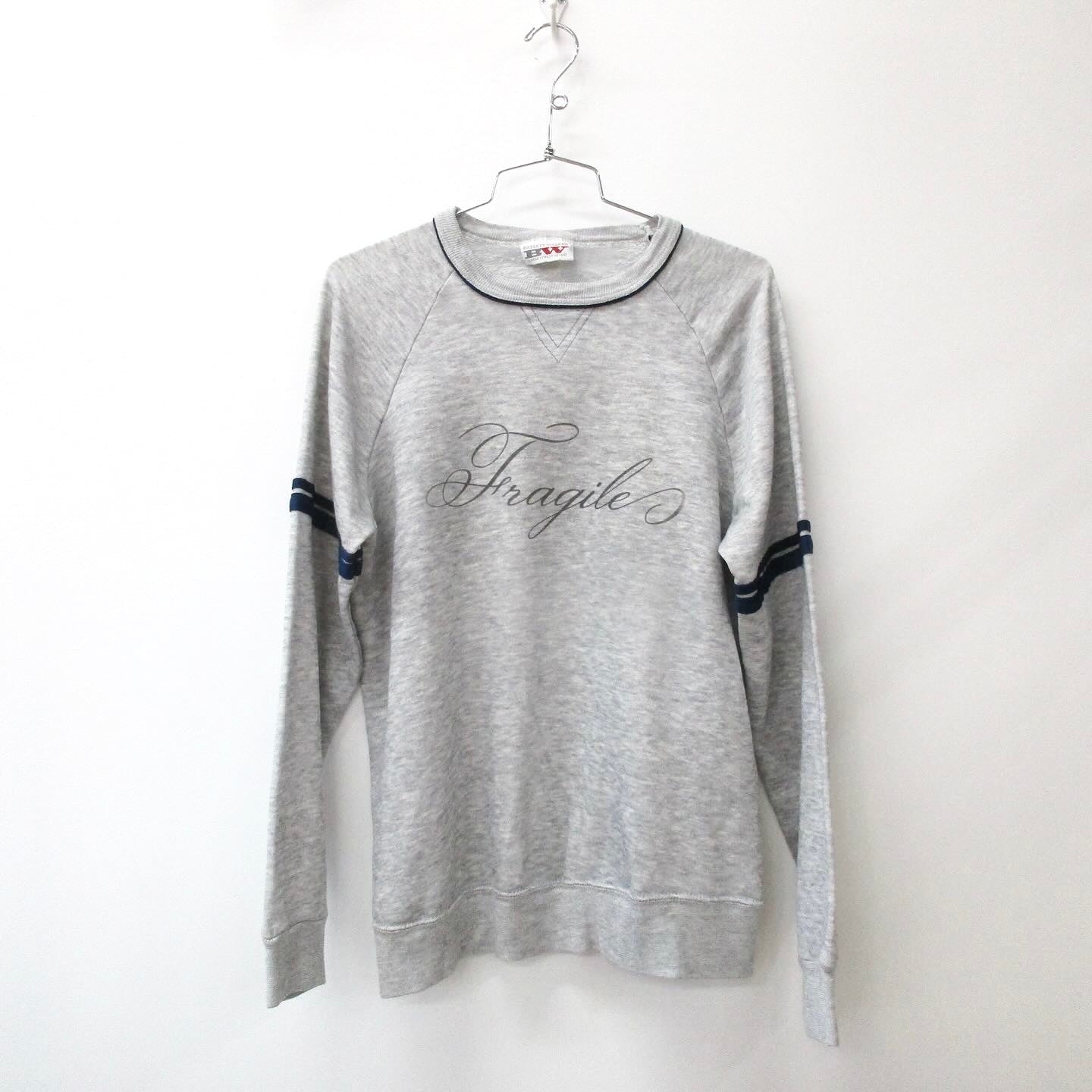 'Fragile' Sweater